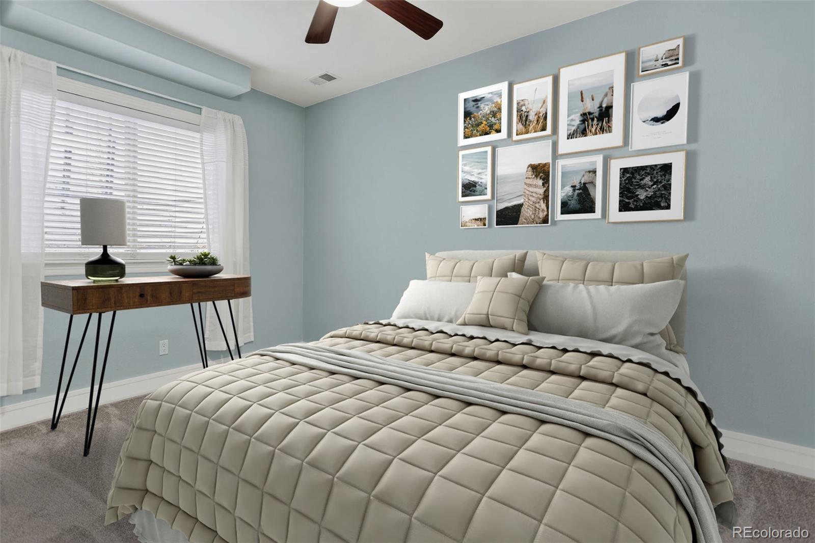 2311 Decatur Street Denver, CO 80211 - Photo 25 of 31 a bedroom with a bed and a table