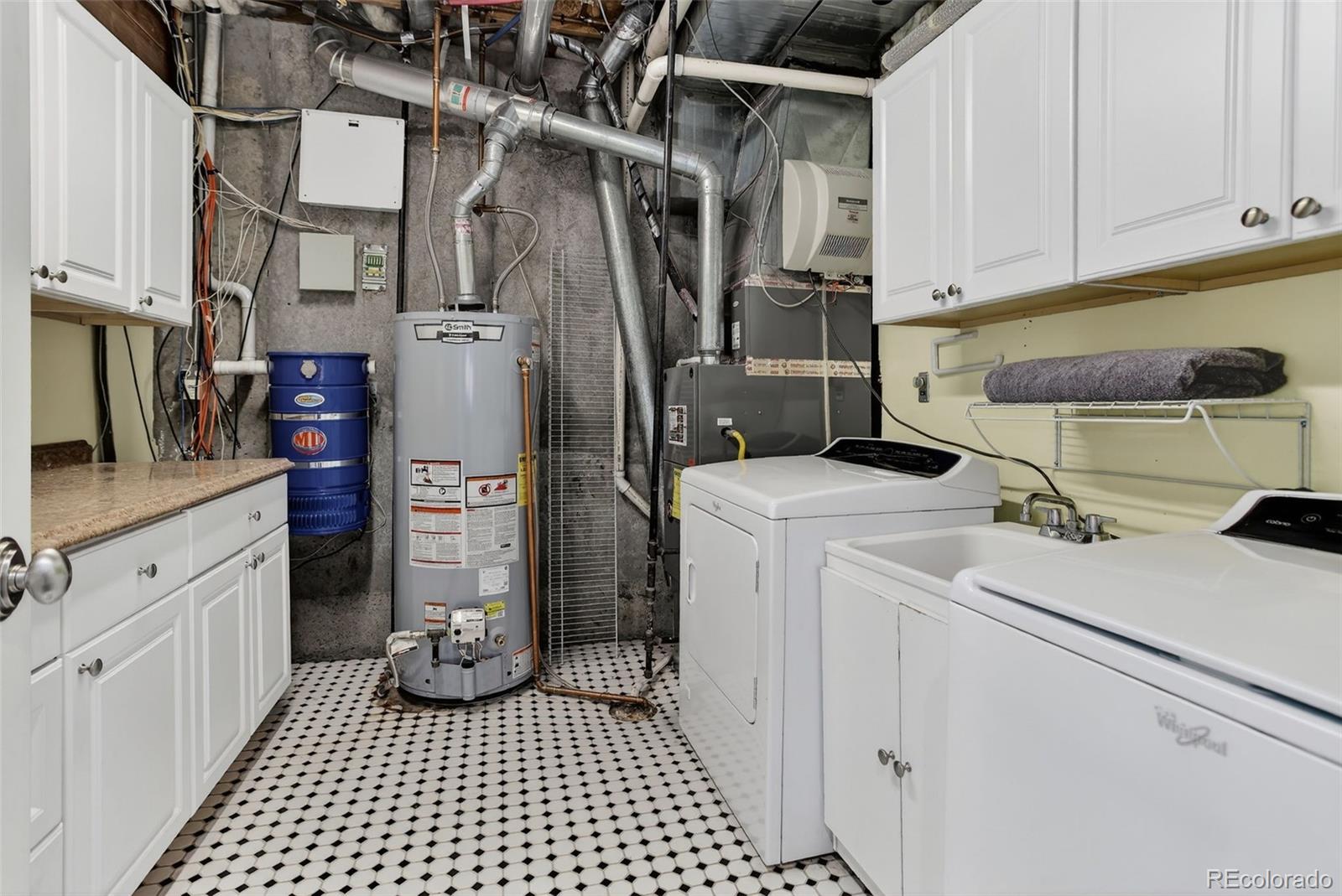 2311 Decatur Street Denver, CO 80211 - Photo 27 of 31 a utility room with dryer and washer