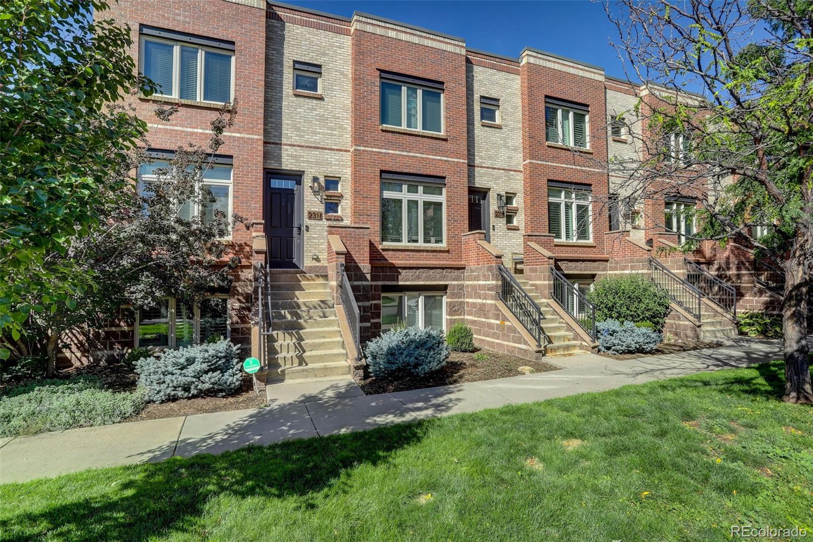 2311 Decatur Street Denver, CO 80211 - Photo 4 of 31 a view of a brick house with a yard and plants