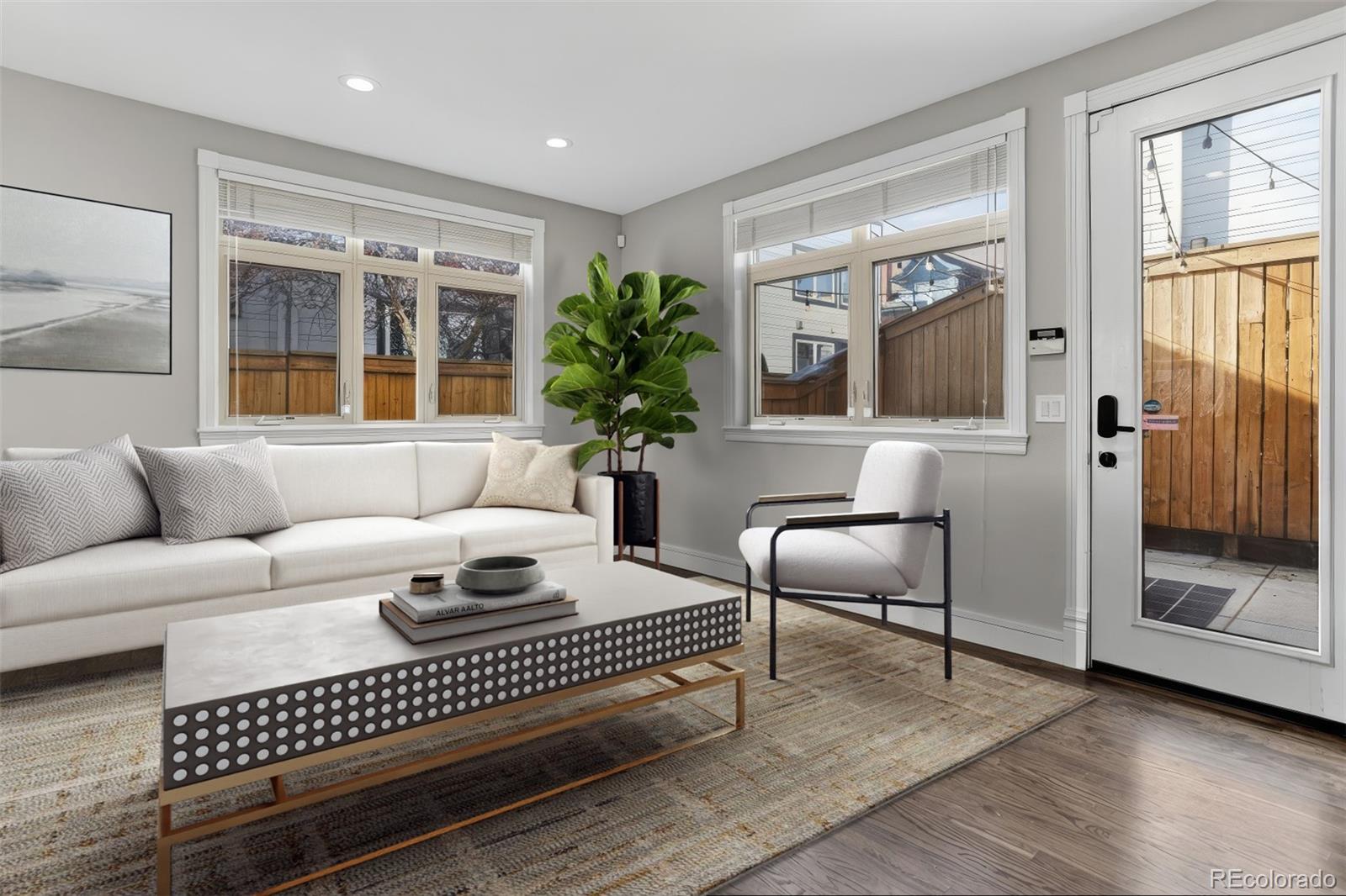 2311 Decatur Street Denver, CO 80211 - Photo 6 of 31 a living room with furniture and a window