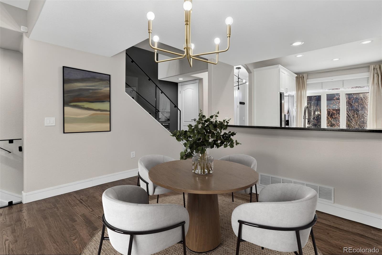 2311 Decatur Street Denver, CO 80211 - Photo 8 of 31 a dining room with furniture and window