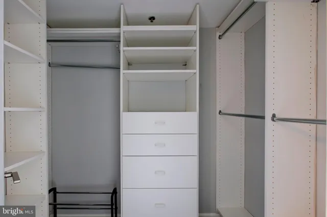 a view of an empty walk in closet