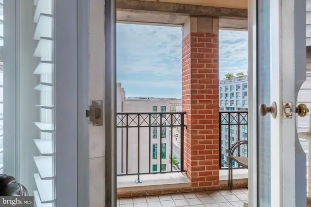 a view of a glass door with a balcony
