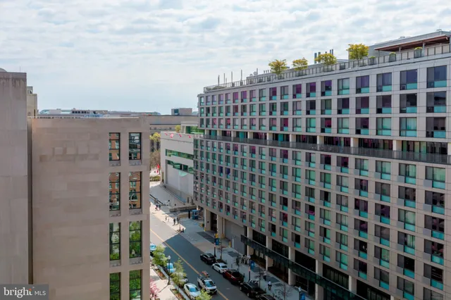 a view of a building with a street
