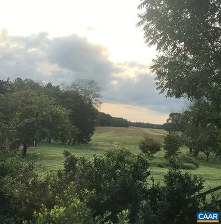 a view of a green field with lots of green space