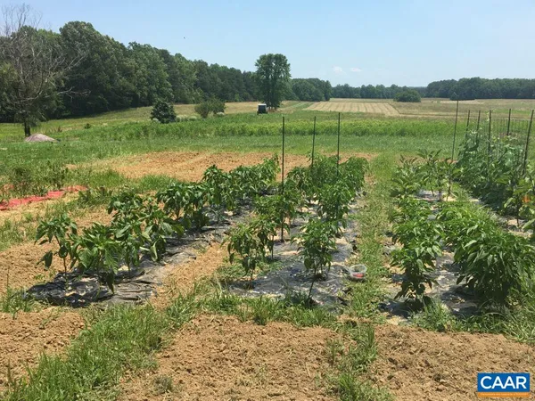 a front view of a house with parking space