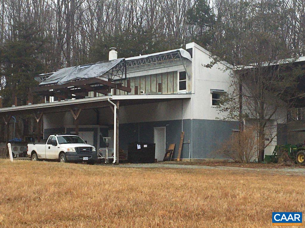 877 Holland Creek Road Louisa, VA 23093 - Photo 36 of 48 a front view of a house with parking space