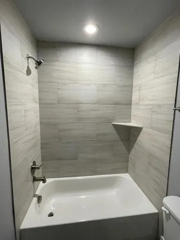 a bathroom with a bathtub