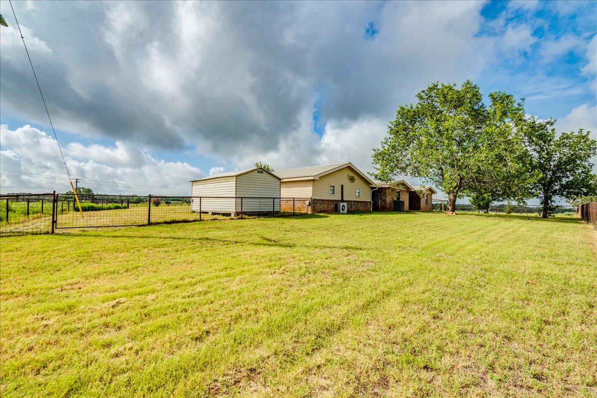 595 Cardinal Road Rosanky, TX 78953 - Photo 35 of 39 a view of swimming pool with an outdoor space and seating area