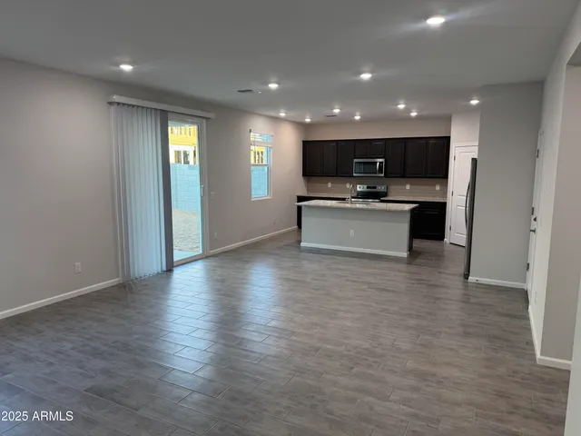 a view of kitchen with microwave and stove