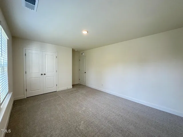a view of empty room with window