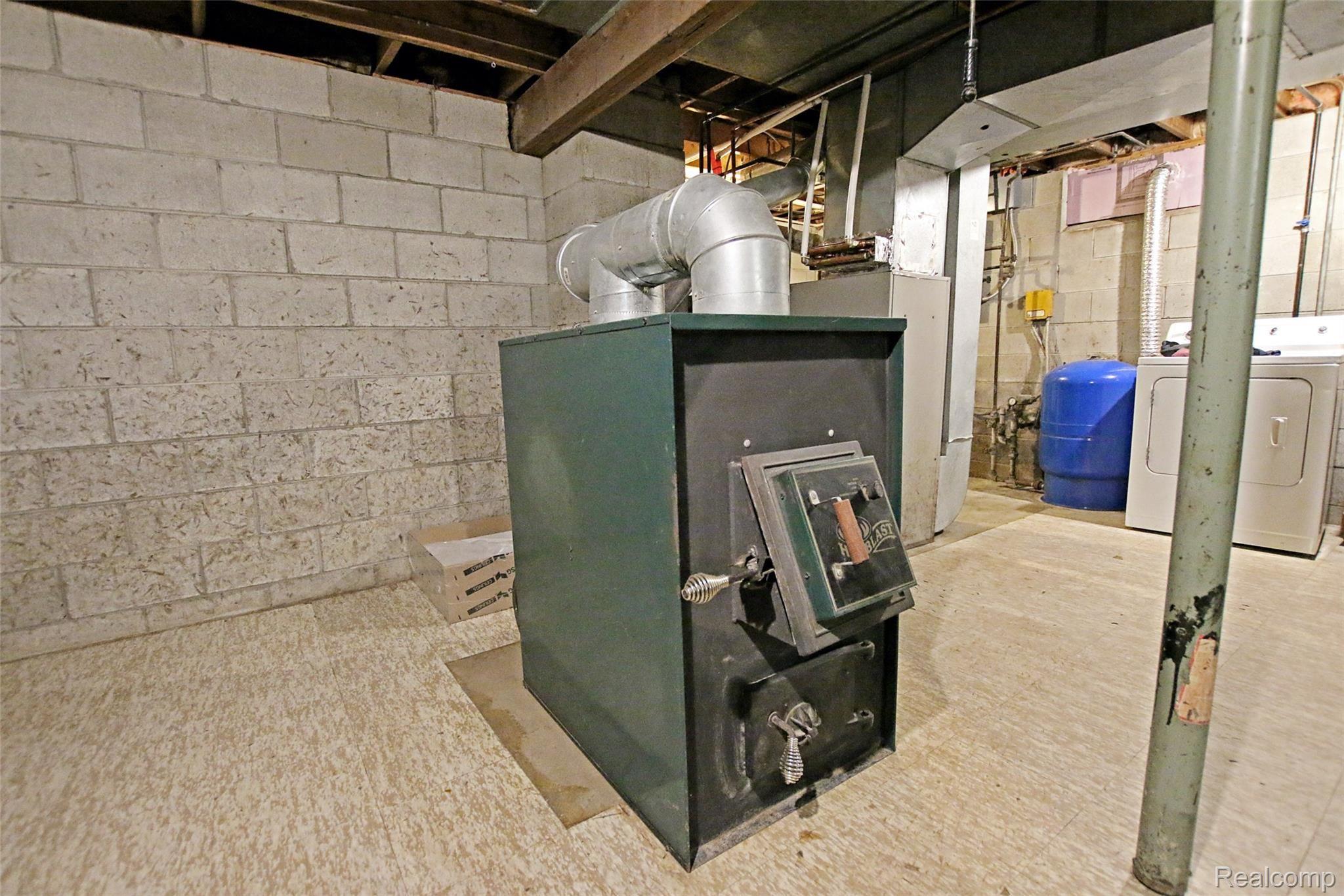 4095 Flint River Road Columbiaville, MI 48421 - Photo 35 of 84 36) Wood Burning Furnace.jpg