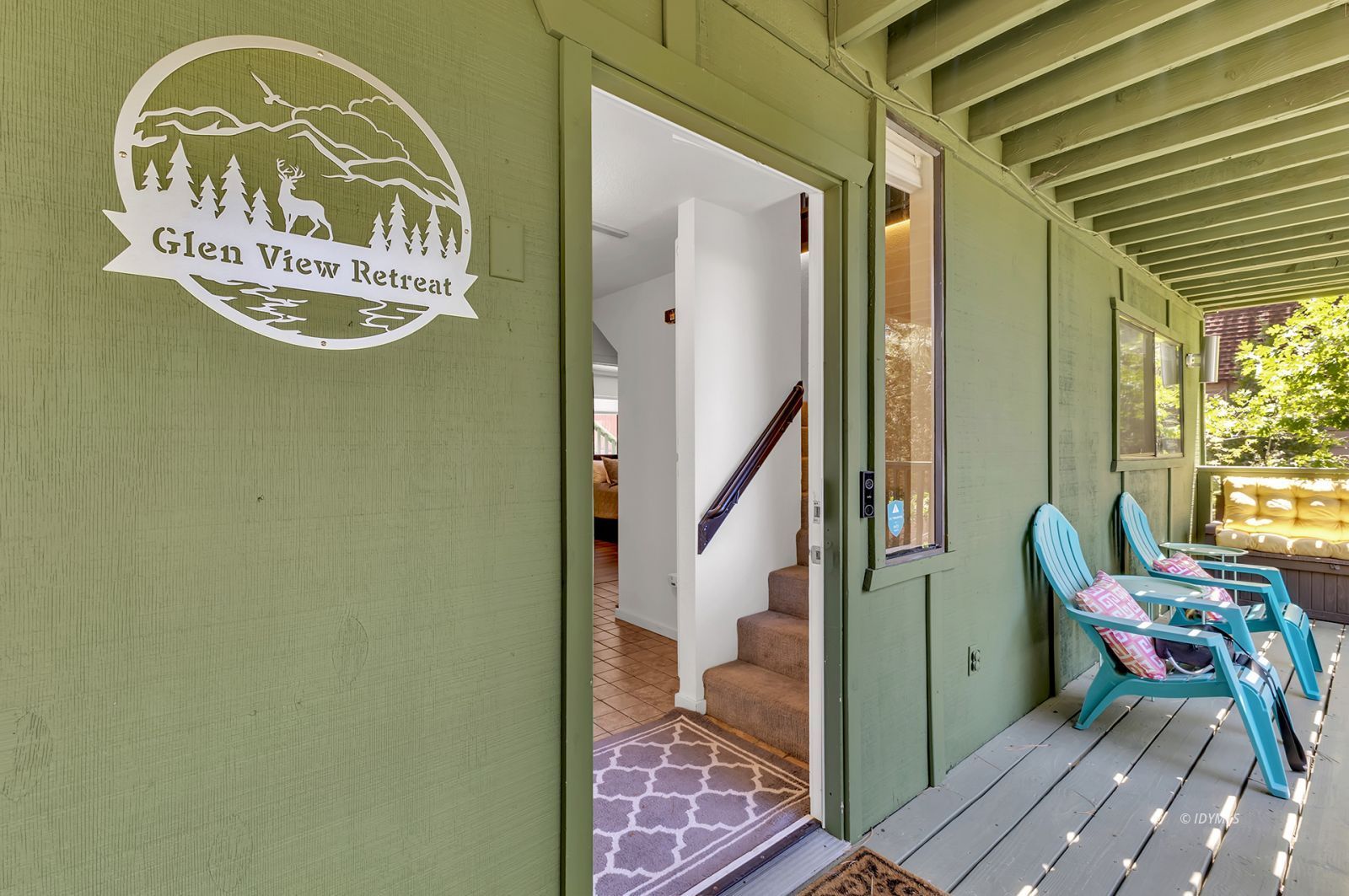 25595 Glen Road Idyllwild, CA 92549 - Photo 14 of 51 a view of a hallway with furniture and front door