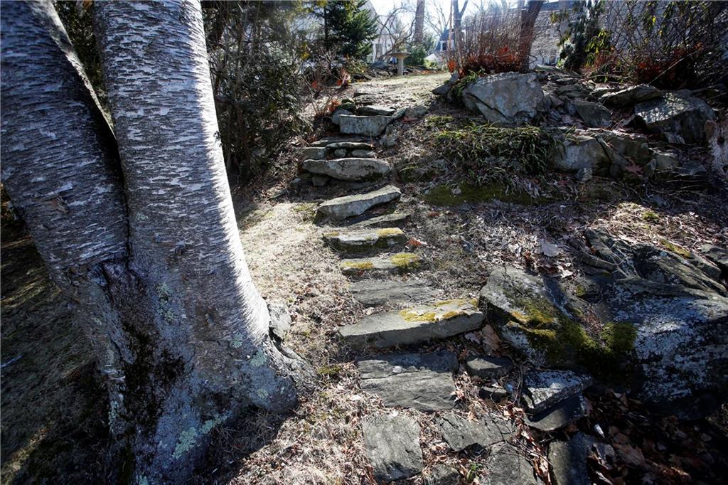 7 Ivie Road Cape Elizabeth, ME 04107 - Photo 3 of 22 Lovely stone gardens and pathway.