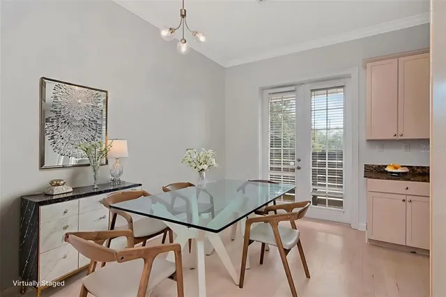 a kitchen with stainless steel appliances granite countertop a white cabinets and a stove