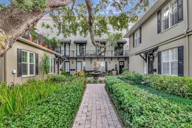 a view of a pathway with a house