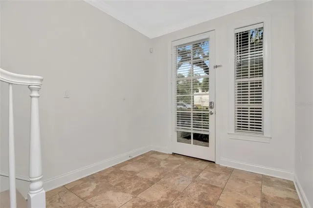 a view of a livingroom with a large window