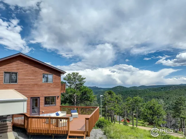 a view of a chairs and table in the terrace