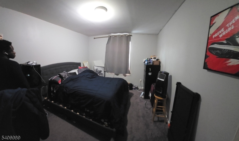 26 Clinton Place Newark, NJ 07108 - Photo 11 of 18 a living room with furniture