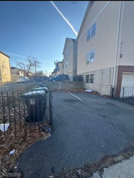 26 Clinton Place Newark, NJ 07108 - Photo 16 of 18 a view of a house with a yard