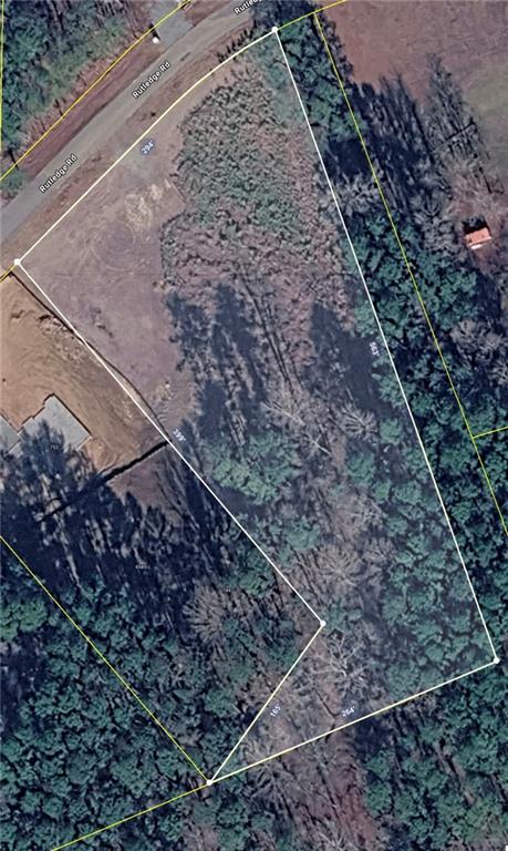 0 Rutledge Road Acworth, GA 30101 - Photo 13 of 14 a view of a yard with wooden fence