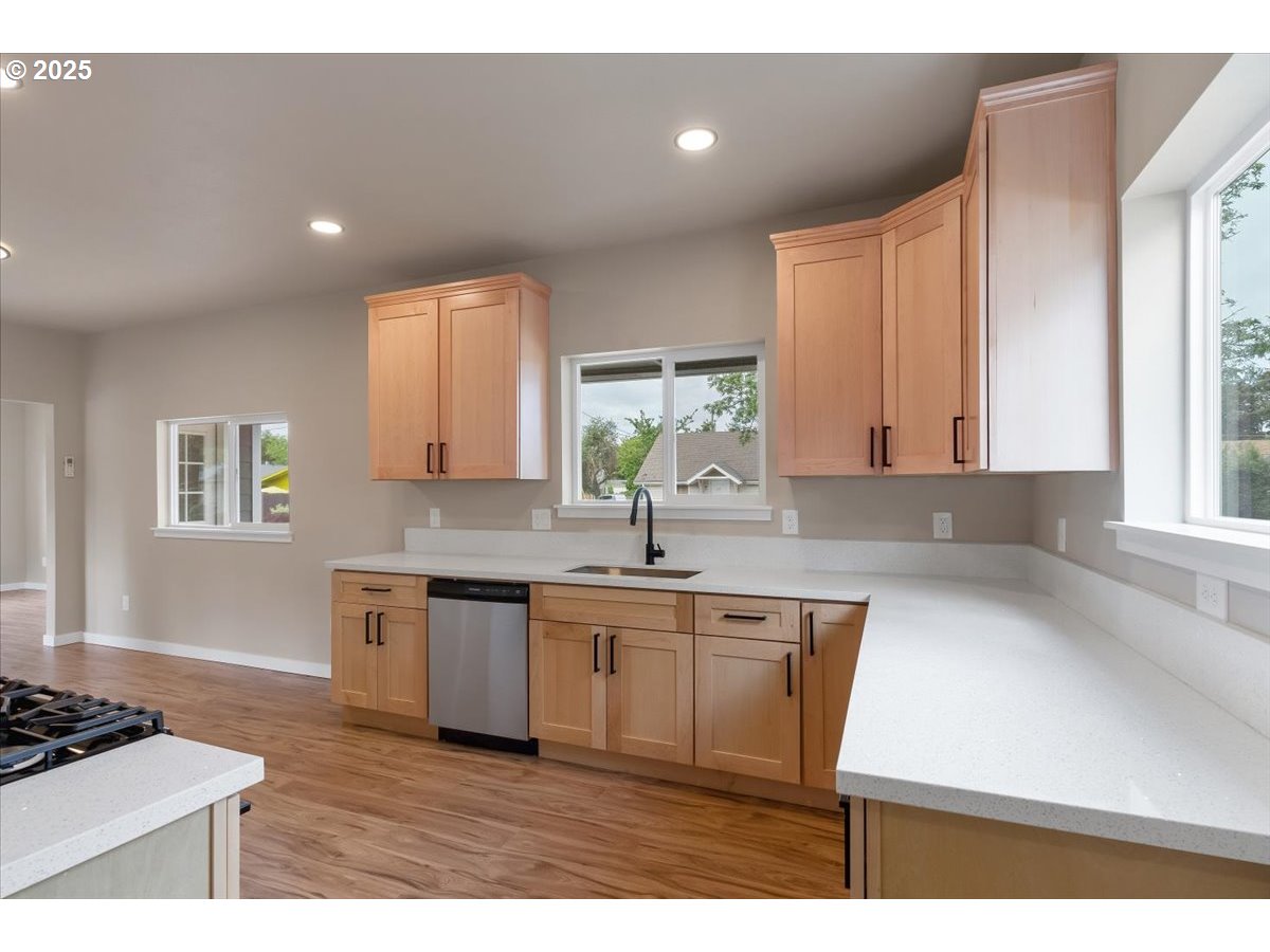 494 17th Street Northeast Salem, OR 97301 - Photo 21 of 44 a kitchen with a sink cabinets and window