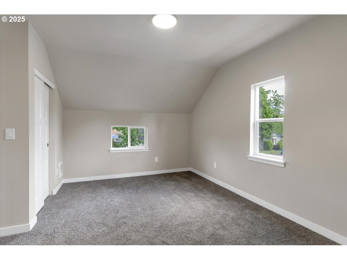494 17th Street Northeast Salem, OR 97301 - Photo 23 of 44 a view of an empty room with a window