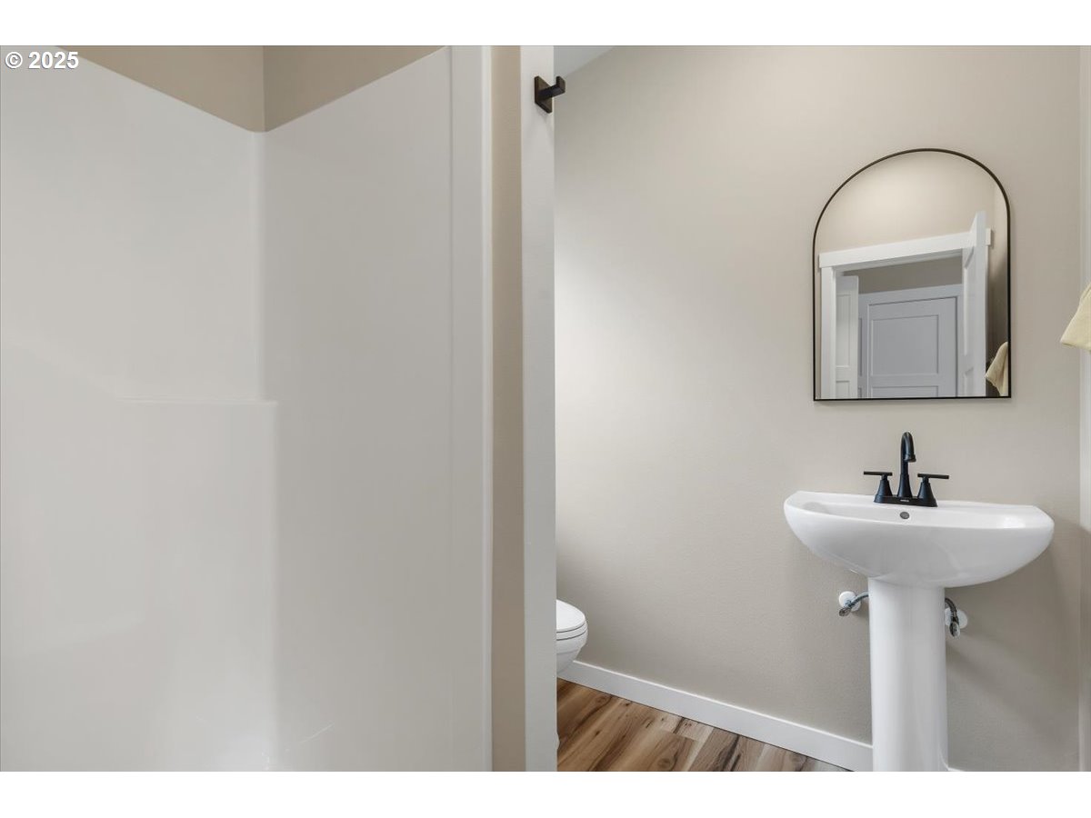 494 17th Street Northeast Salem, OR 97301 - Photo 33 of 44 a bathroom with a sink and a mirror