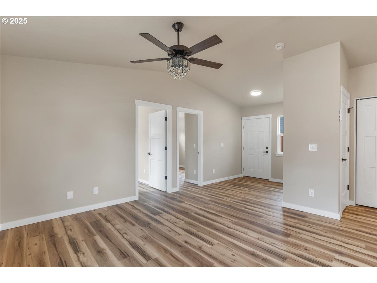494 17th Street Northeast Salem, OR 97301 - Photo 39 of 44 a view of an empty room and wooden floor
