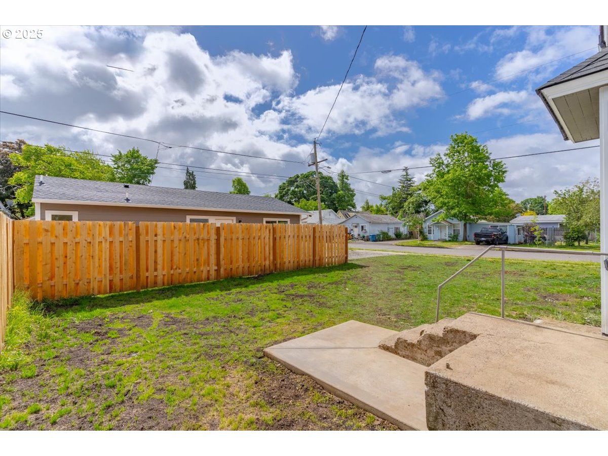 494 17th Street Northeast Salem, OR 97301 - Photo 7 of 44 a view of a backyard with a garden