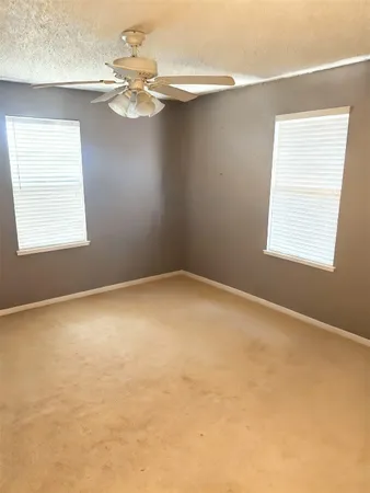 en empty room with a window