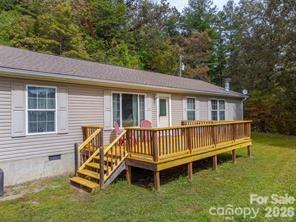 179 Fresh Water Rdg Road Whittier, NC 28789 - Photo 3 of 48 a view of a house with backyard and porch
