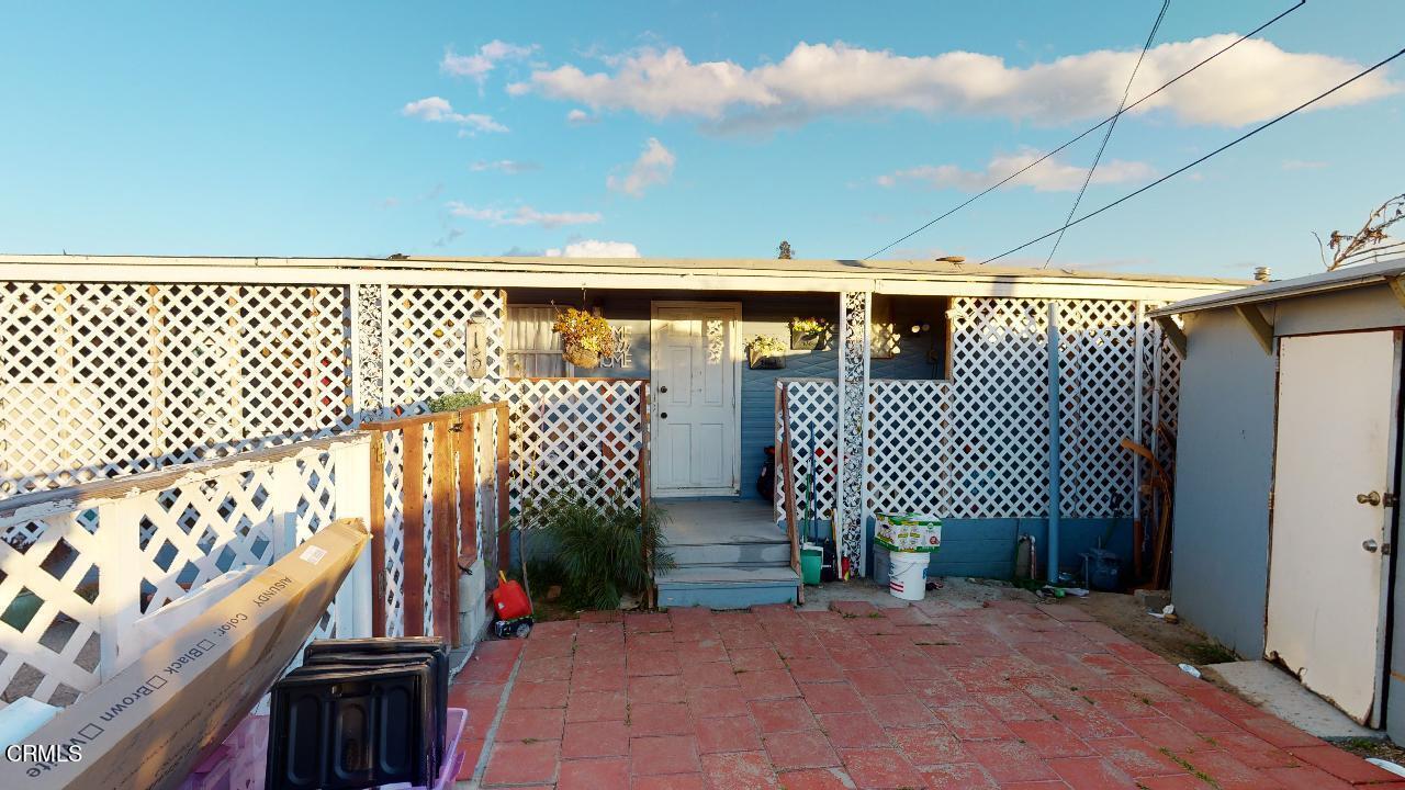 1906 Old Telegraph Road, Unit 15 Fillmore, CA 93015 - Photo 1 of 24 a view of a sink and bench with wooden fence
