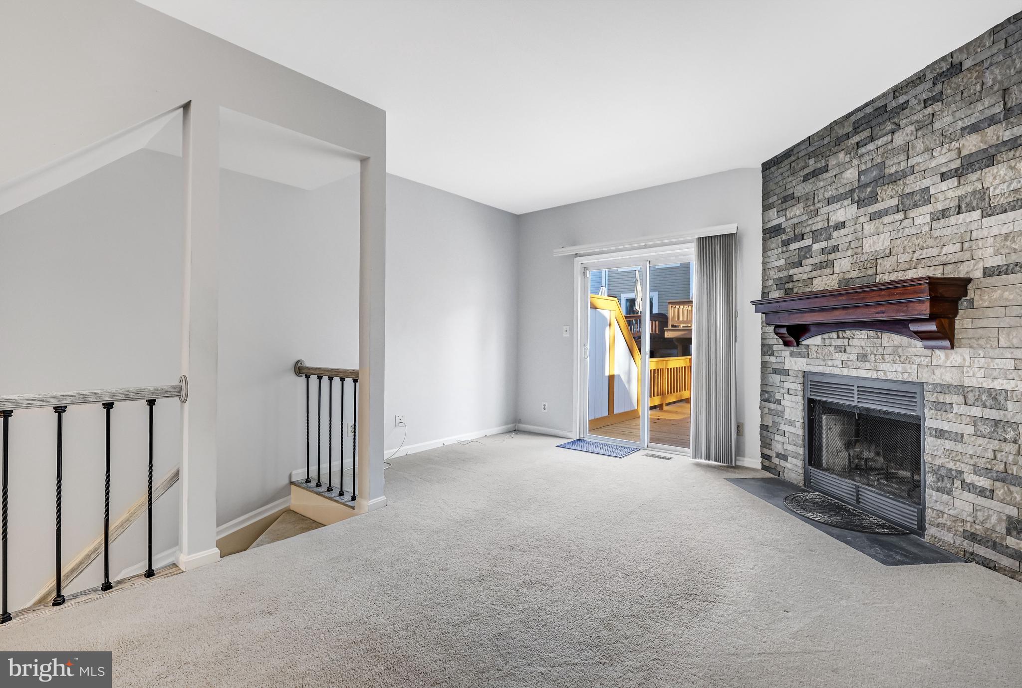 5905 St Giles Way Alexandria, VA 22315 - Photo 19 of 55 BIG Living Room w/Fireplace and SGD to HUGE Deck