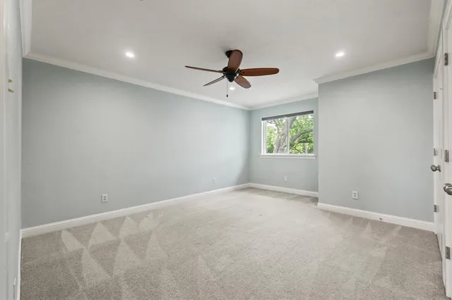 a bathroom with a shower sink and mirror