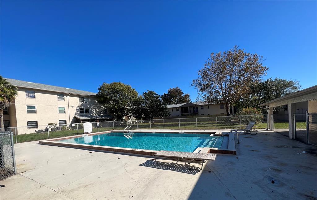 1916 Honour Road, Unit 1 Orlando, FL 32839 - Photo 20 of 20 a view of a swimming pool with a patio