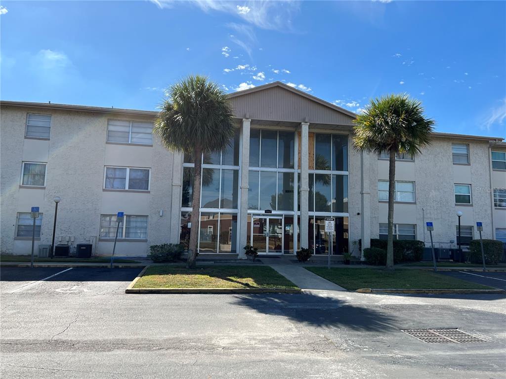 1916 Honour Road, Unit 1 Orlando, FL 32839 - Photo 4 of 20 front view of a house with a swimming pool