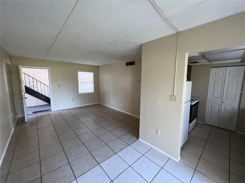 1916 Honour Road, Unit 1 Orlando, FL 32839 - Photo 8 of 20 a view of an empty room and window