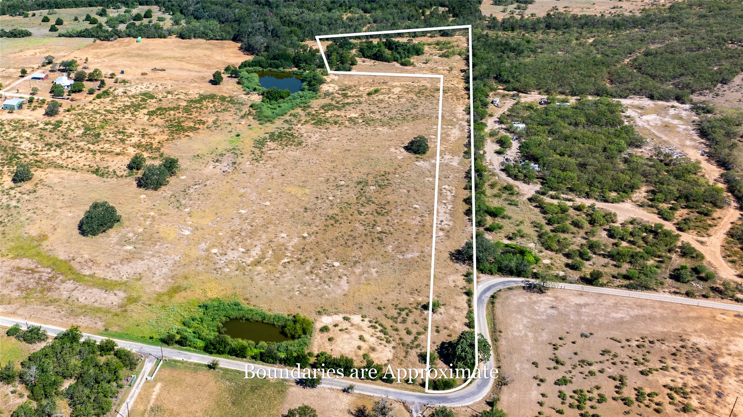 Overview of rural landscape with property parcel outlined
