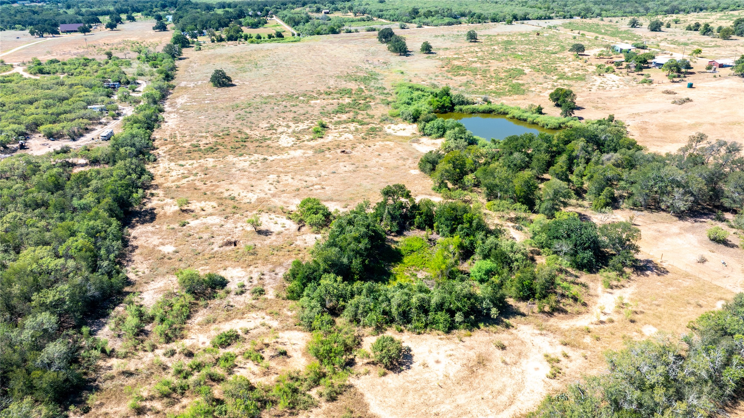 Lot 3 Tumbleweed Trail Dale, TX 78616 - Photo 2 of 20 View of rural area featuring a large body of water