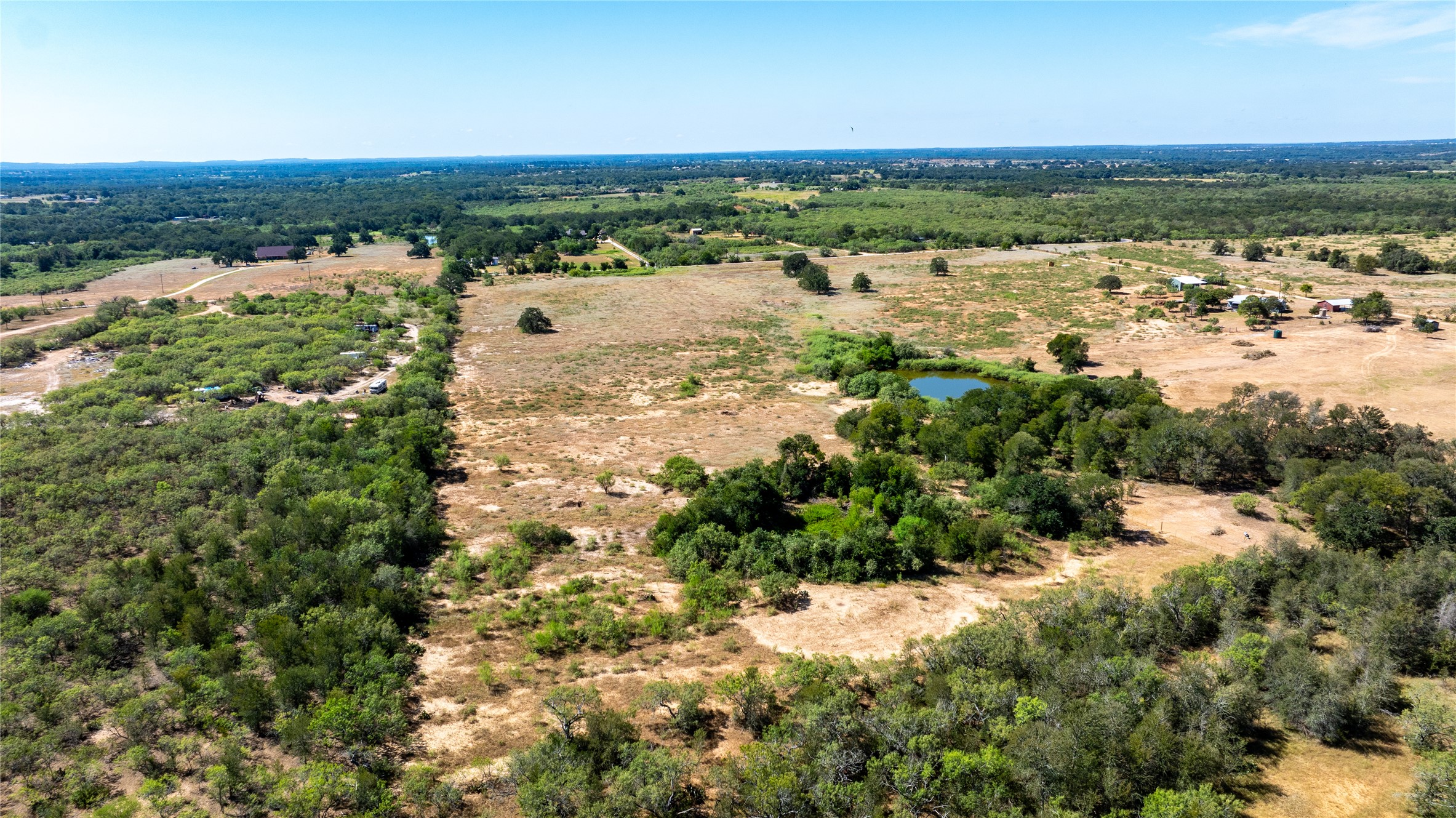 Lot 3 Tumbleweed Trail Dale, TX 78616 - Photo 10 of 20 Overview of rural landscape featuring a large body of water