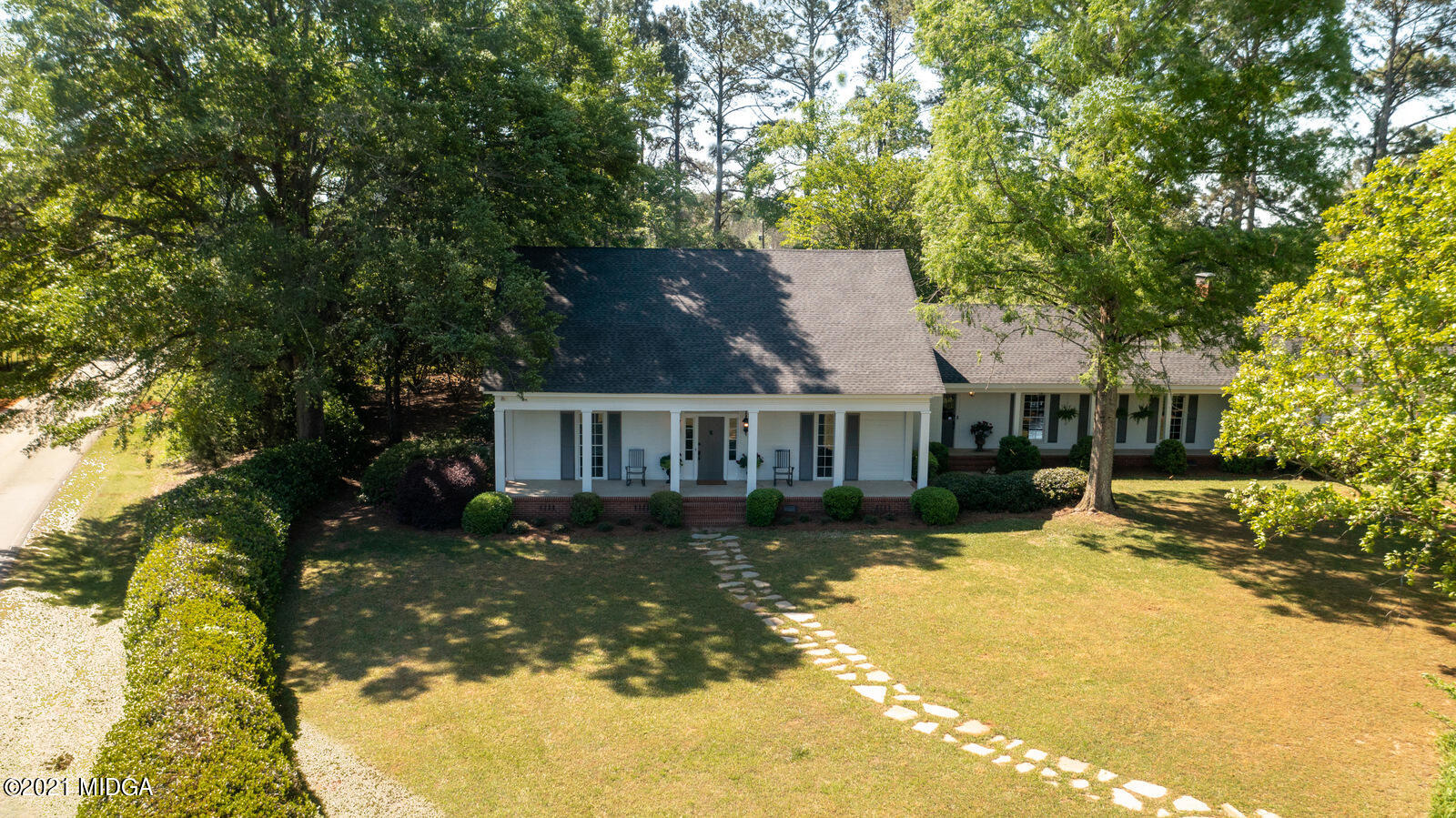 2569 Maynards Mill Road Forsyth, GA 31029 - Photo 58 of 67 a view of a house with a yard
