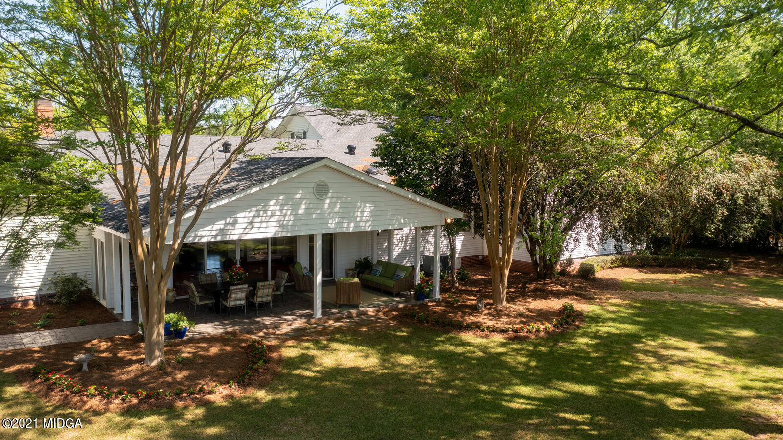 2569 Maynards Mill Road Forsyth, GA 31029 - Photo 61 of 67 a view of a house with a yard