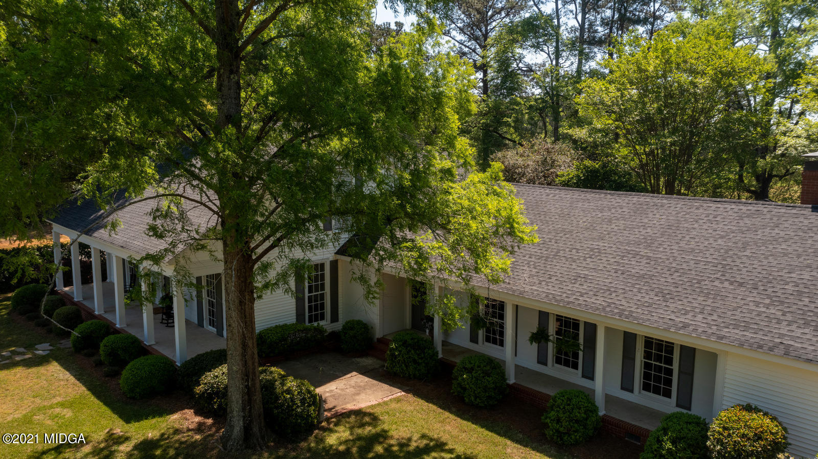 2569 Maynards Mill Road Forsyth, GA 31029 - Photo 63 of 67 a backyard of a house with lots of green space