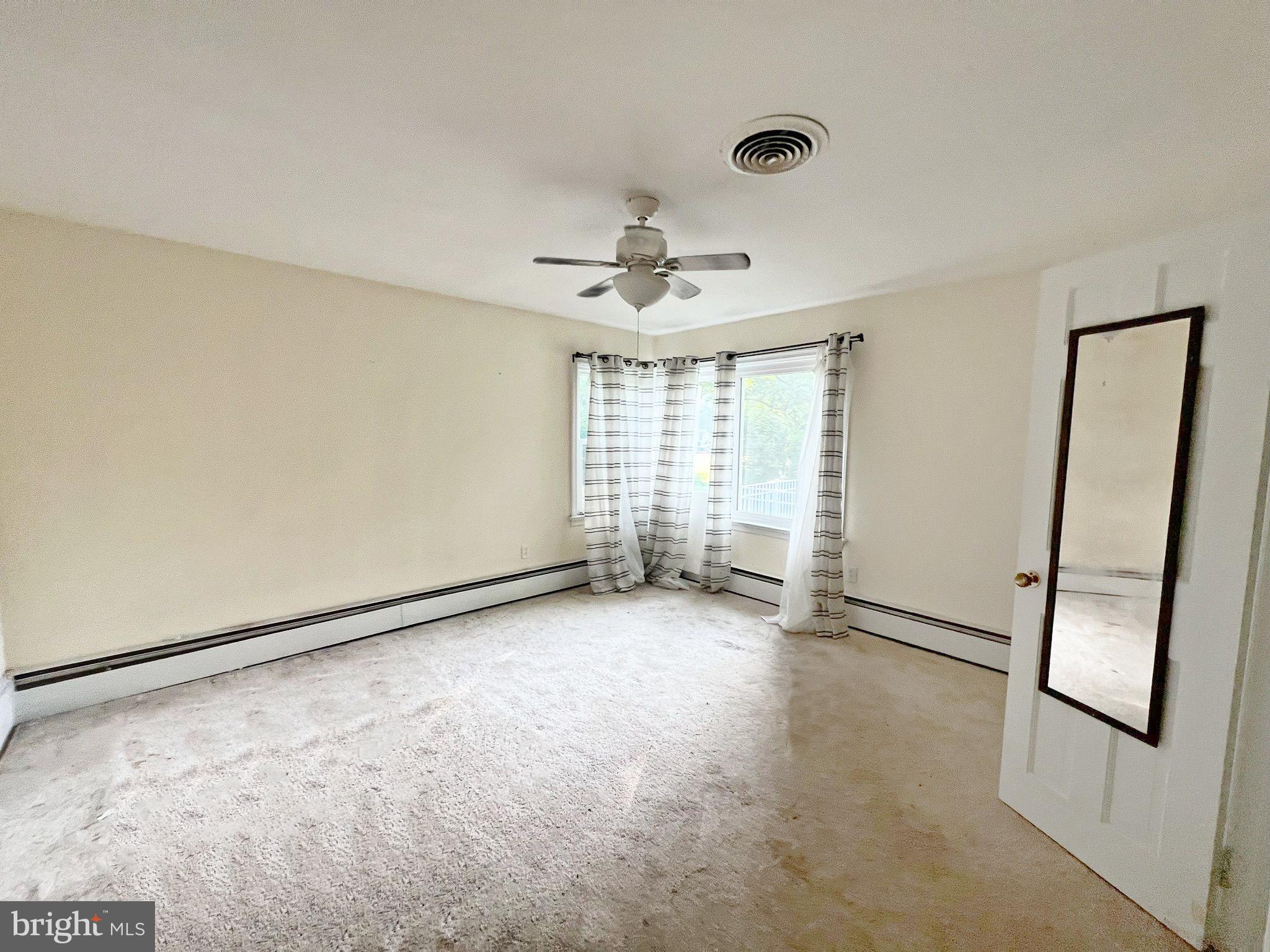 800 Church Hill Road Centreville, MD 21617 - Photo 11 of 19 a view of an empty room with a window