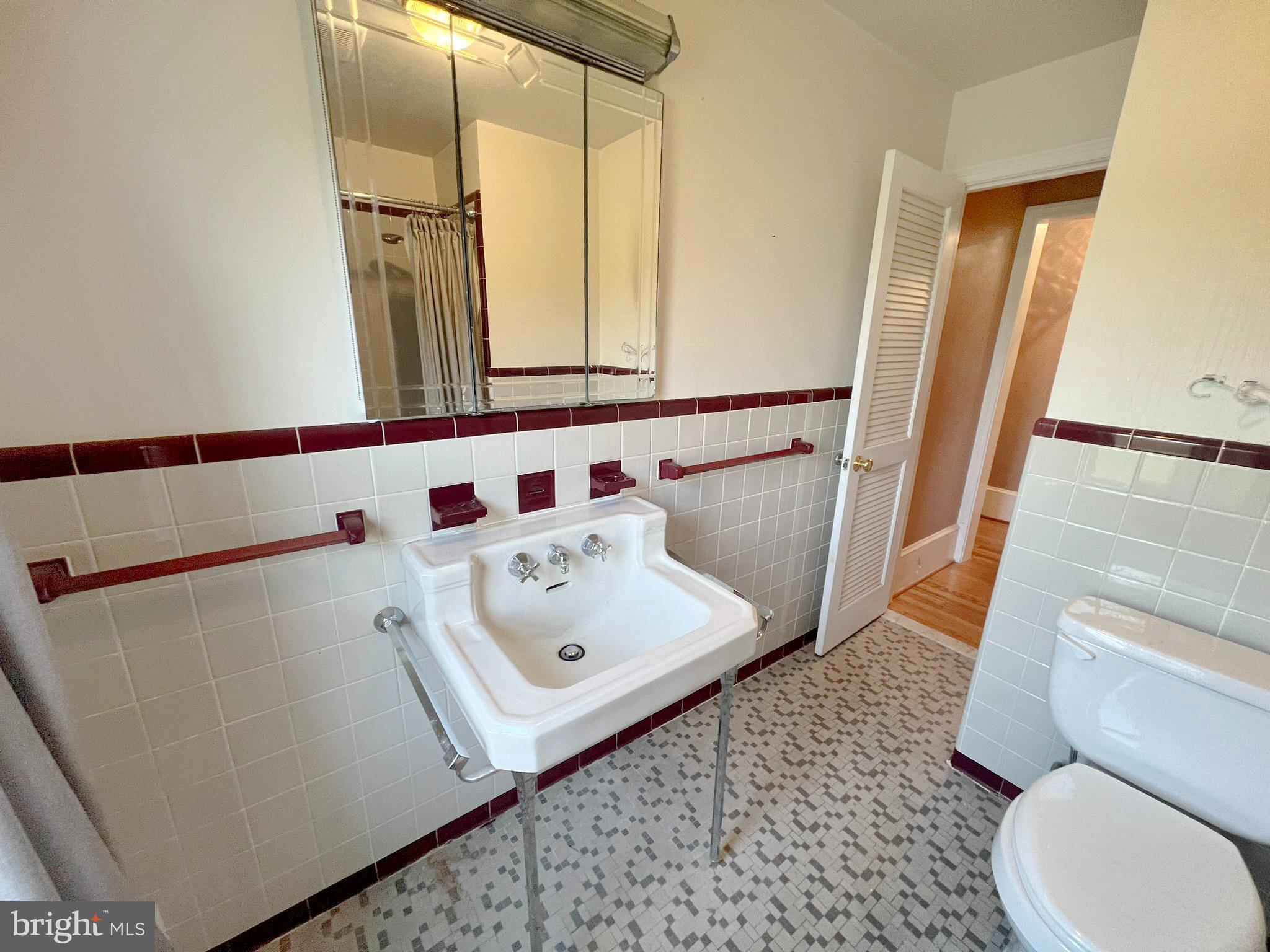 800 Church Hill Road Centreville, MD 21617 - Photo 14 of 19 a bathroom with a sink toilet and mirror