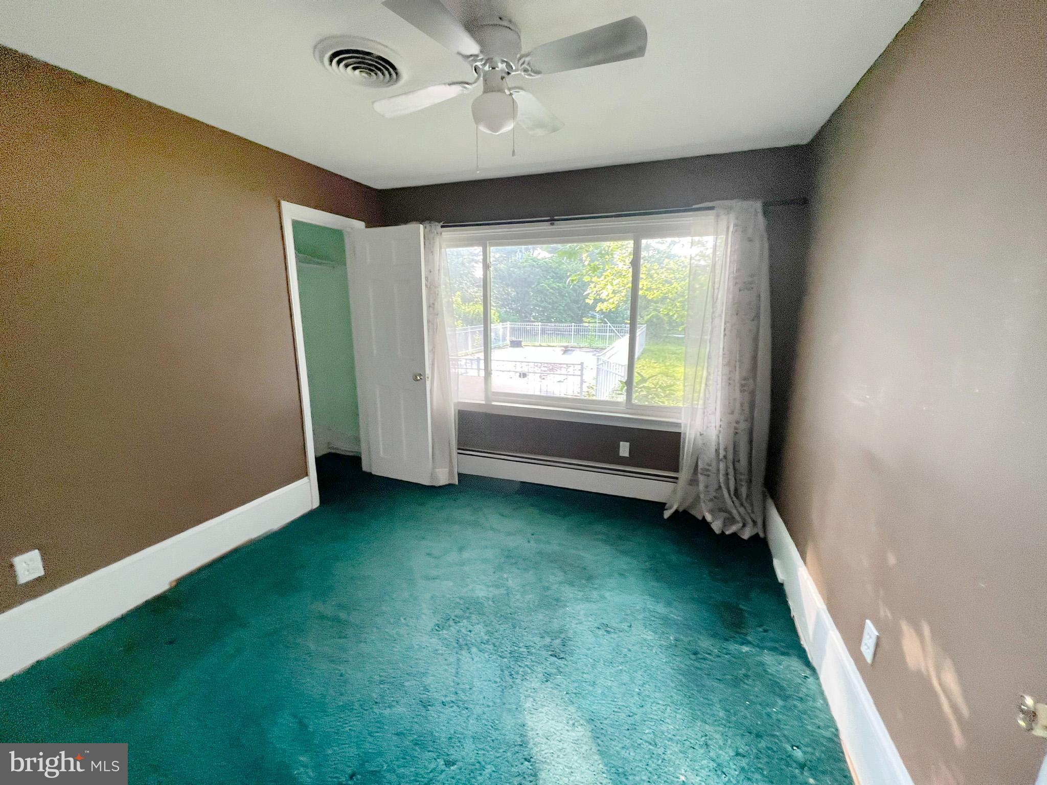 800 Church Hill Road Centreville, MD 21617 - Photo 16 of 19 a view of room with window and ceiling fan
