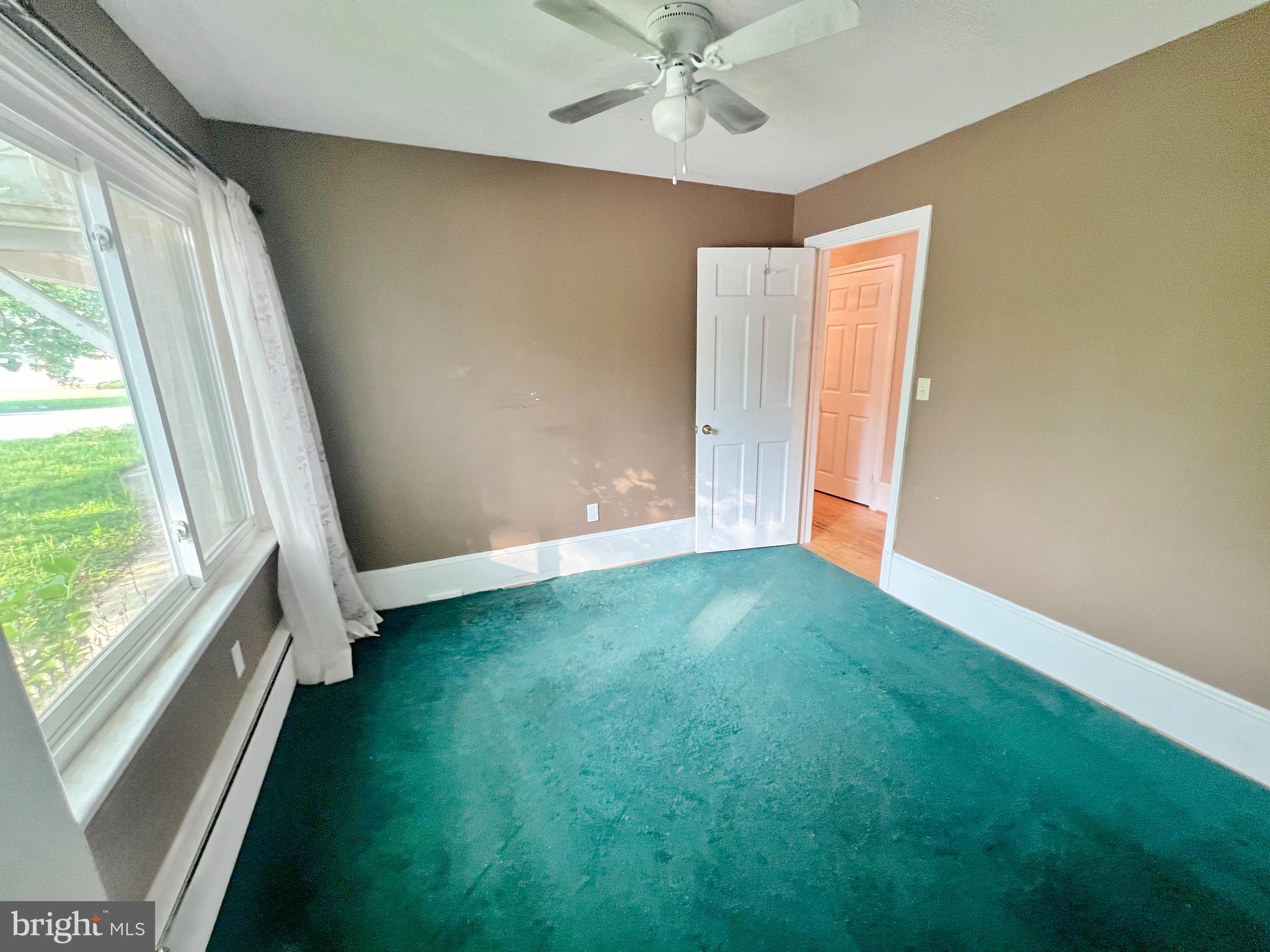 800 Church Hill Road Centreville, MD 21617 - Photo 17 of 19 a view of an empty room with a window