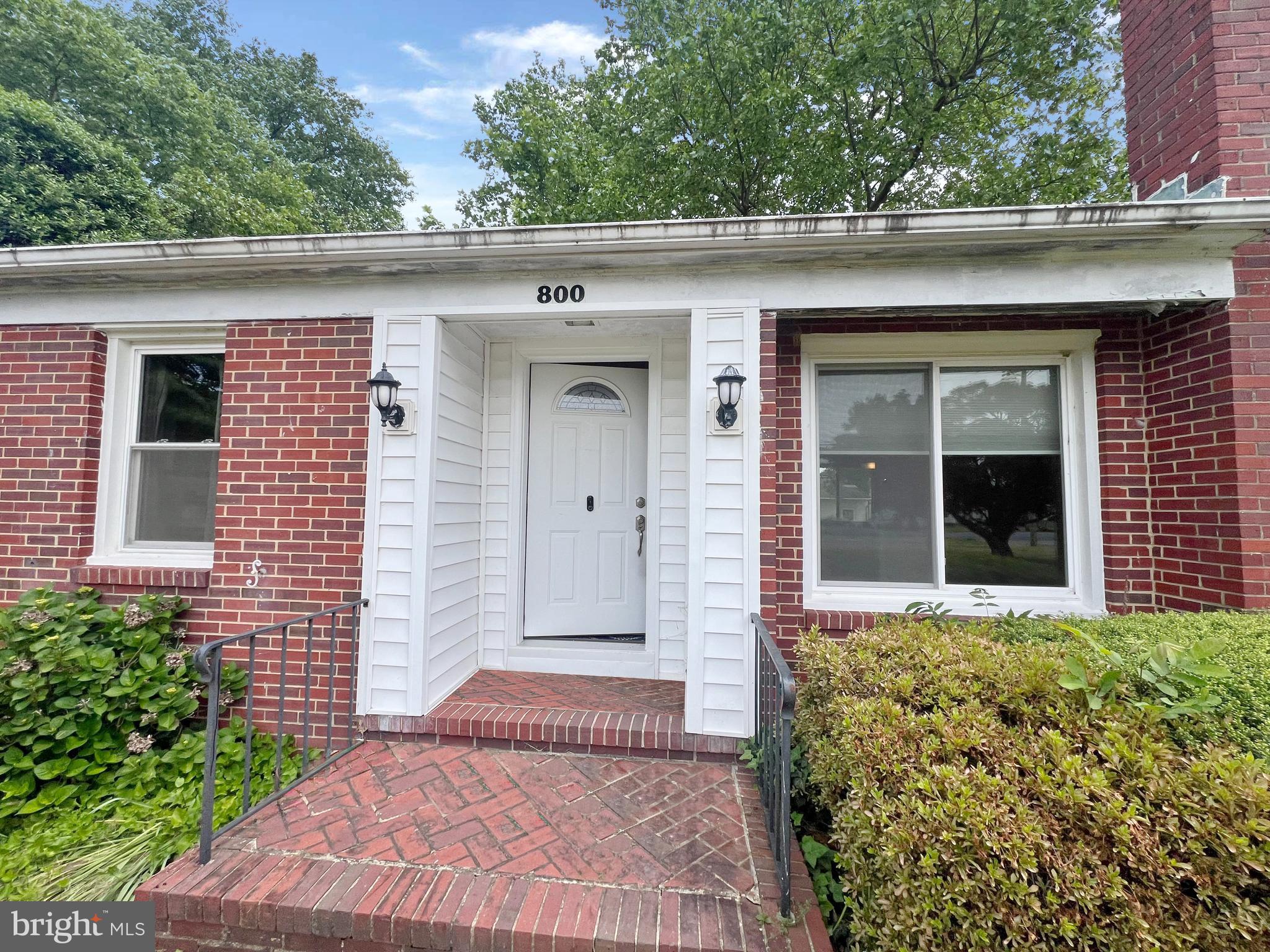 800 Church Hill Road Centreville, MD 21617 - Photo 2 of 19 front view of a house with a yard