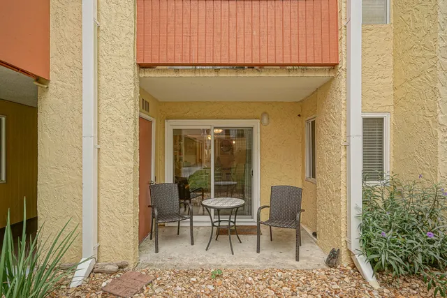 a dining room with a chair and table